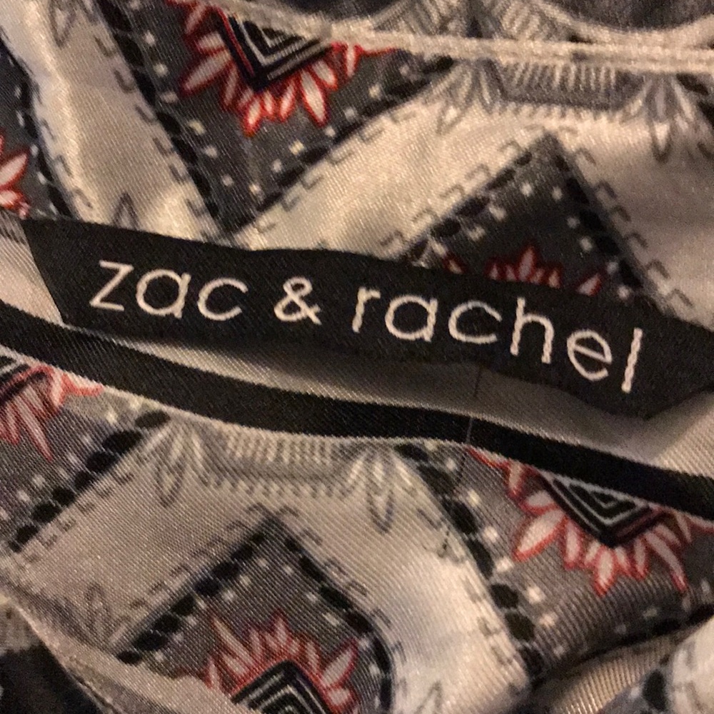 Over button up blouse... designer Zac and Rachel